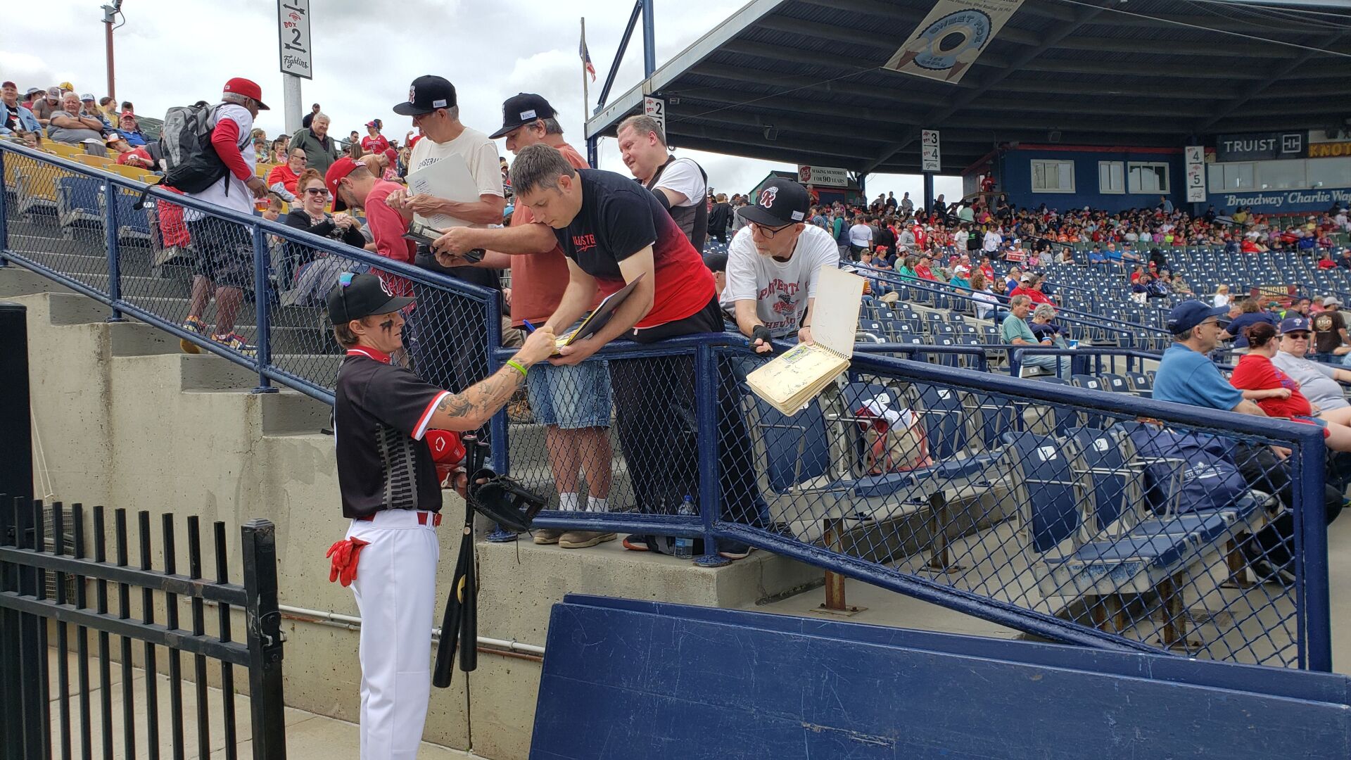 Phillies Mickey Moniak signing autographs for fans at FirstEnergy Stadium